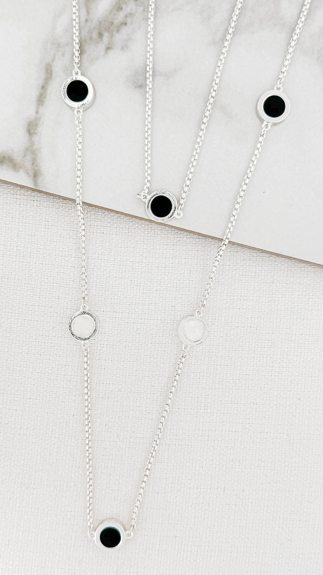 Envy Layered Necklace With Black and Mother Pearl Discs